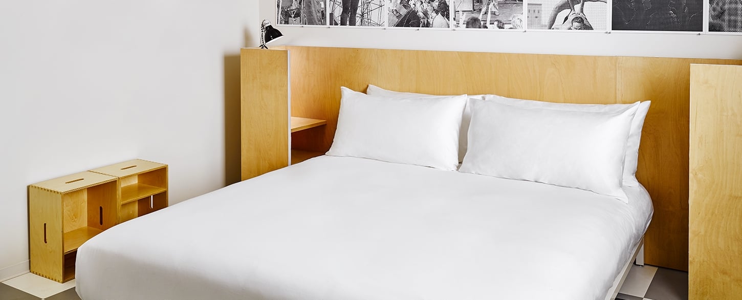 bed with built-in side tables