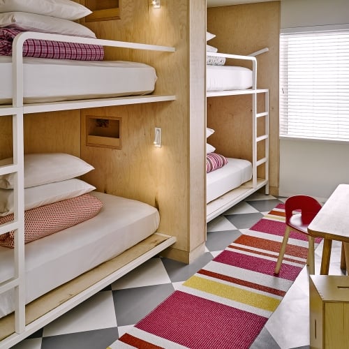 bedroom with four bunkbeds