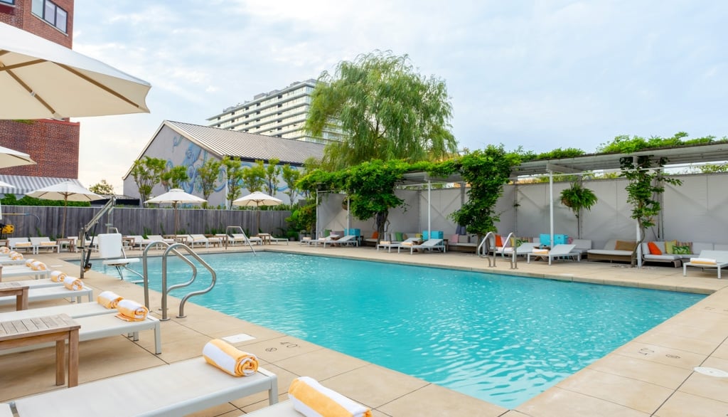 The Asbury's vibrant seasonal pool deck in Asbury Park