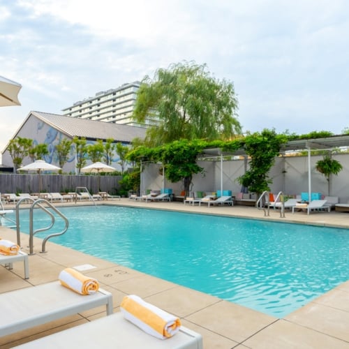 The Asbury's vibrant seasonal pool deck in Asbury Park