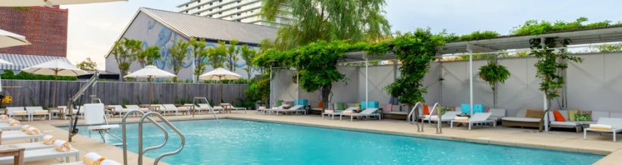 The Asbury's vibrant seasonal pool deck in Asbury Park