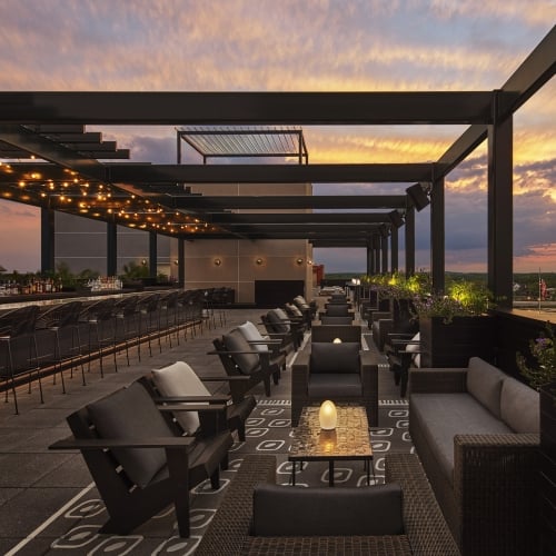 Salvation rooftop lounge area at sunset
